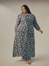 A woman dressed in Navy Tun Habiba Eyelet Set