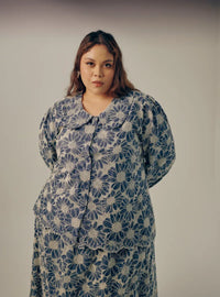 A woman dressed in Navy Tun Habiba Eyelet Set