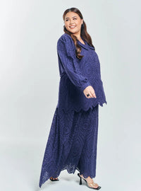 A woman Navy Tun Hasmah Eyelet Skirt Set