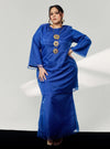 A woman in dressed in Navy Tun Sharimah Organza Kurung