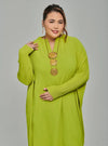A woman dressed in Neon Green Tun Aimellia Pleated Maxi Dress
