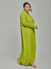 A woman dressed in Neon Green Tun Aimellia Pleated Maxi Dress