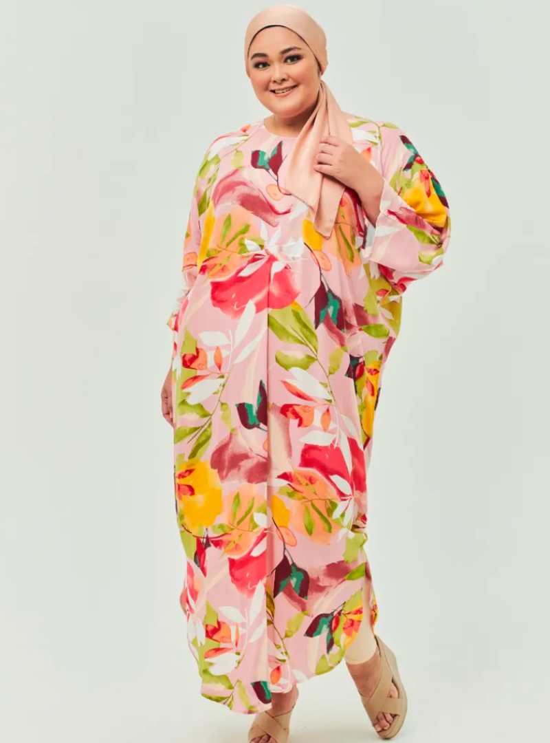 A woman dressed in Neon Pink Essential Front Knot Kaftan