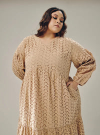 A woman dressed in Nude Lola Cotton Eyelet Princess Dress