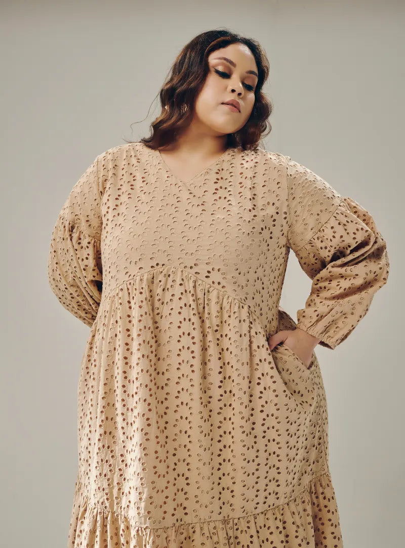 A woman dressed in Nude Lola Cotton Eyelet Princess Dress