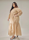 A woman dressed in Nude Lola Cotton Eyelet Princess Dress