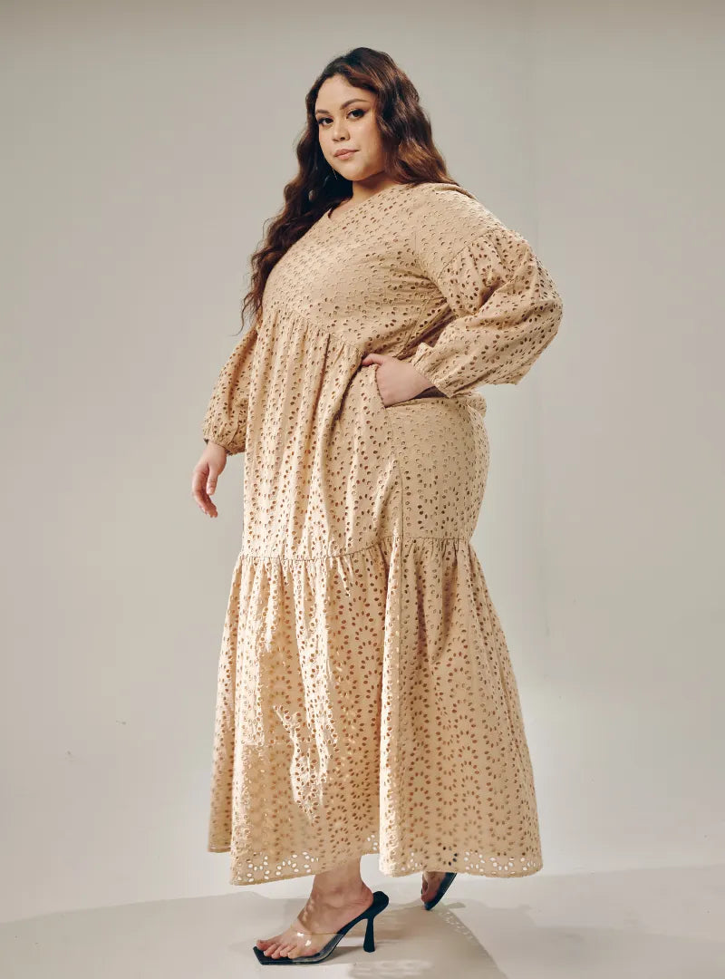 A woman dressed in Nude Lola Cotton Eyelet Princess Dress