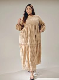 A woman dressed in Nude Lola Cotton Eyelet Princess Dress