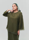 A woman dressed in Olive Tun Aminah Organza Basic Kurung