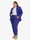 A woman wearing Oxford Blue Skinny Tuxedo Trouser
