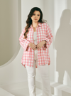 A woman dressed in Pink Jennie Oversized Checked Cotton Shirts