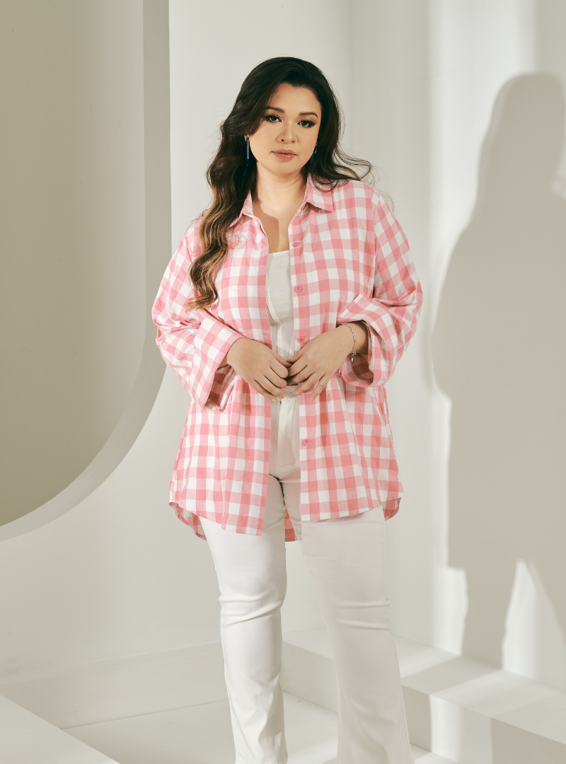 A woman dressed in Pink Jennie Oversized Checked Cotton Shirts