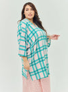 A woman dressed in Pink Tun Azeeza Kaftan Top