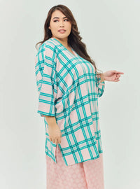 A woman dressed in Pink Tun Azeeza Kaftan Top
