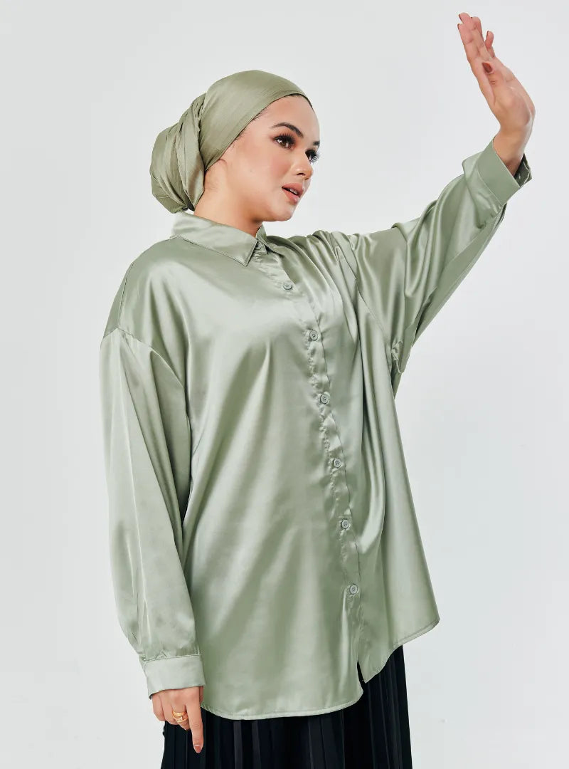 A woman dressed in Pistachio Dropped Shoulder Satin Shirt