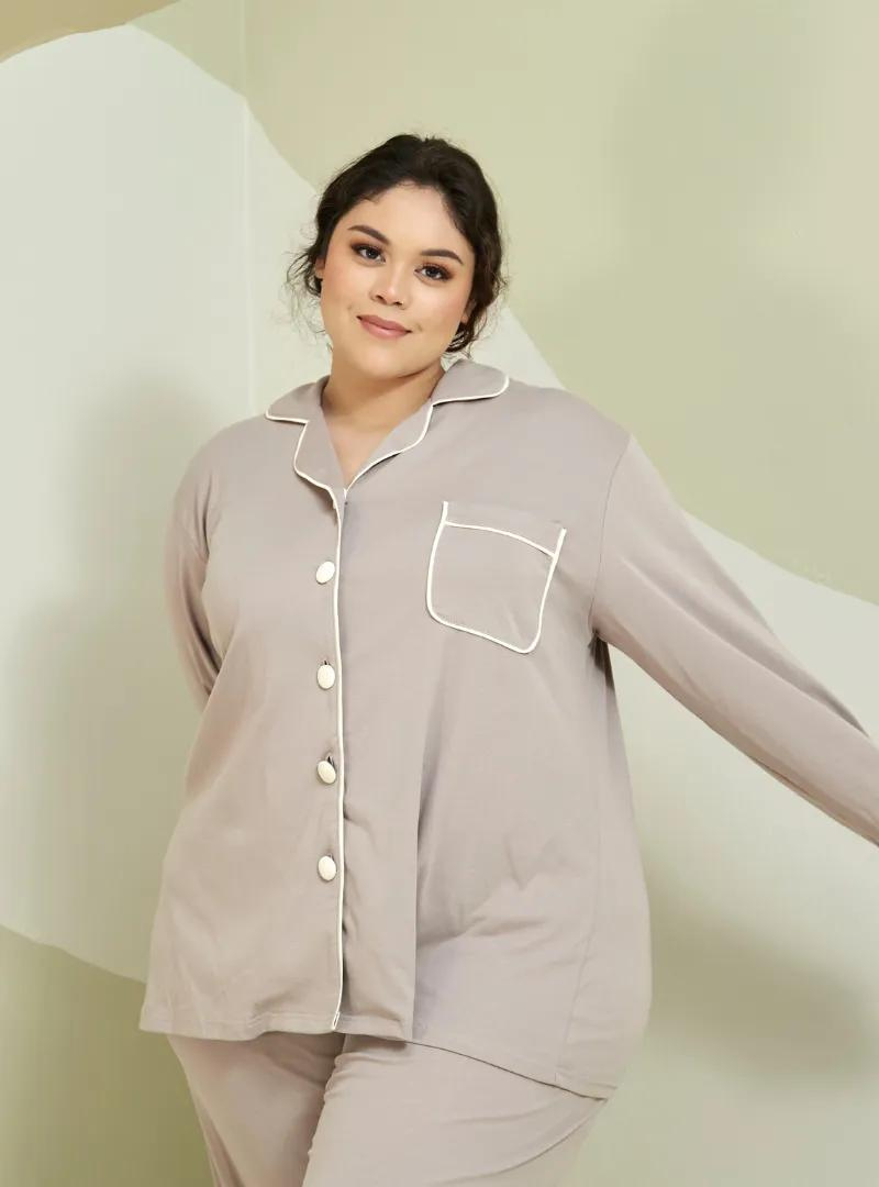 A woman dressed in Light Taupe Premium Cotton Pyjamas
