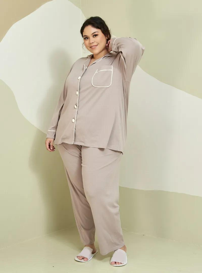A woman dressed in Light Taupe Premium Cotton Pyjamas