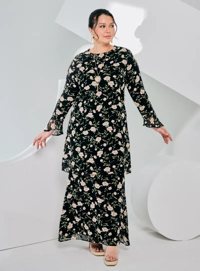 A woman dressed in Black Printed Chiffon
