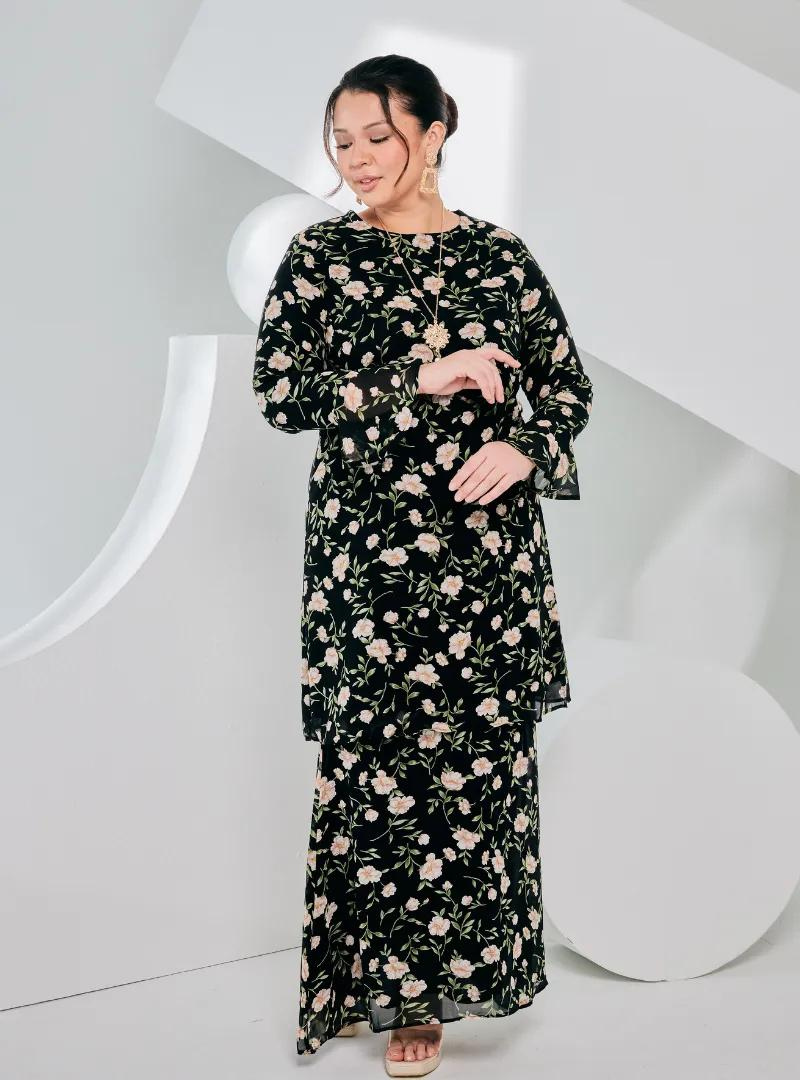 A woman dressed in Black Printed Chiffon