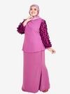A woman dressed in Raisin High Neck Butterfly Kurung