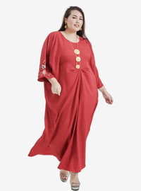 A woman dressed in Red Kak Ton Kaftan