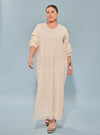 A woman dressed in Rice High Slit Long Lace Dress