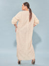 A woman dressed in Rice High Slit Long Lace Dress