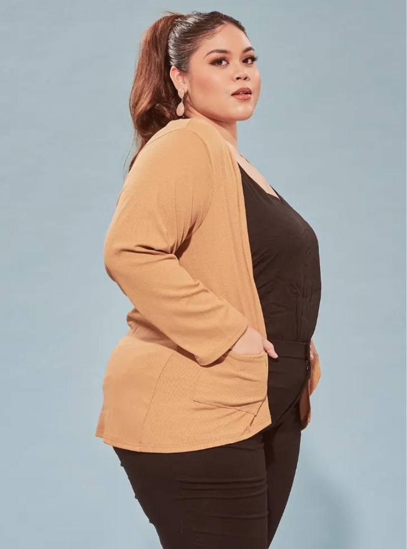 A woman dressed in Sand Summer Knitted Cardigan