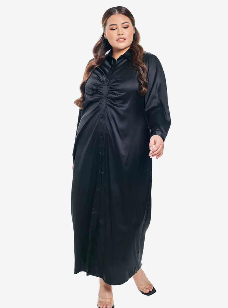 A woman dressed in Black Satin Longline Ruched Shirt Dress