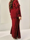 A woman wearing Scarlet Red Ezzah Eyelet Doll Skirt
