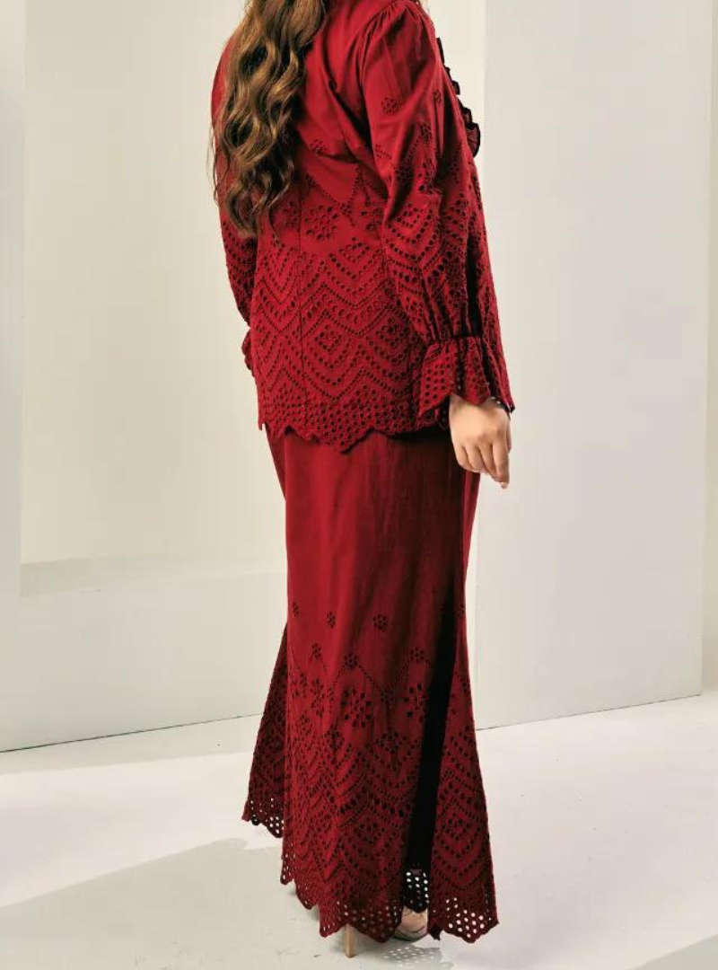 A woman wearing Scarlet Red Ezzah Eyelet Doll Skirt