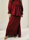 A woman wearing Scarlet Red Ezzah Eyelet Doll Skirt