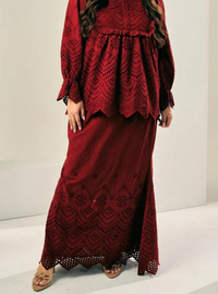 A woman wearing Scarlet Red Ezzah Eyelet Doll Skirt