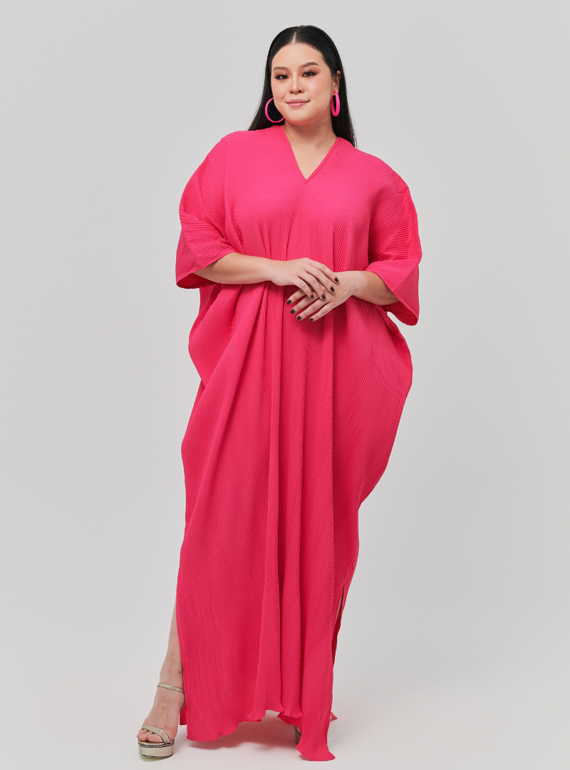 A woman Dressed in Hot Pink Signature Pleated Kaftan