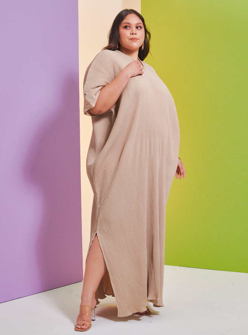 A woman Dressed in Latte Signature Pleated Kaftan