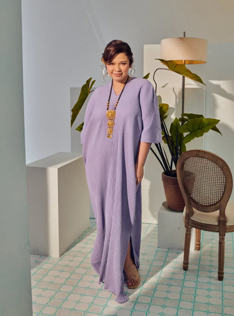 A woman Dressed in Lilac Signature Pleated Kaftan