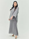 A woman dressed in Silver Grey Tun Aminah Organza Basic Kurung