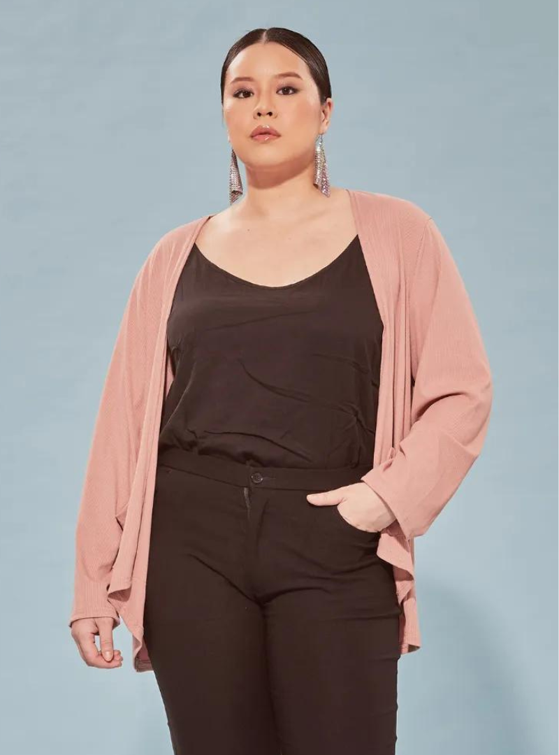 A woman dressed in Skin Summer Knitted Cardigan