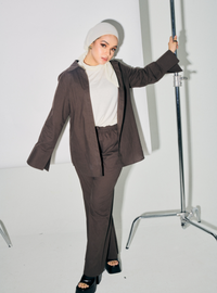 A woman dressed in Stone Grey Oversized Cotton Set