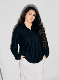 A woman dressed in All Black Regular Striped Slim FIt Polo