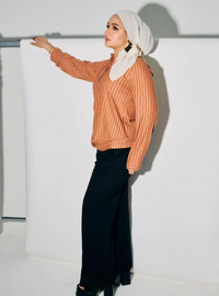 A woman dressed in Cinnamon Regular Striped Slim FIt Polo