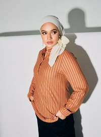 A woman dressed in Cinnamon Regular Striped Slim FIt Polo