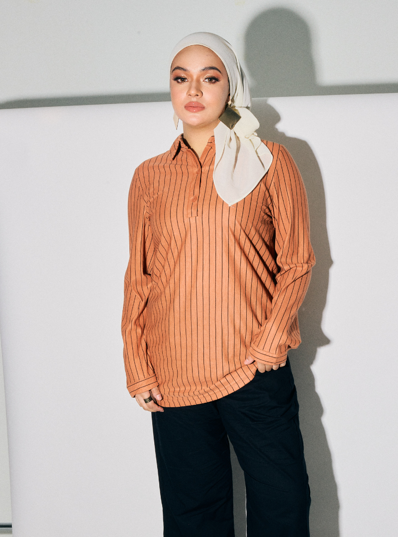 A woman dressed in Cinnamon Regular Striped Slim FIt Polo