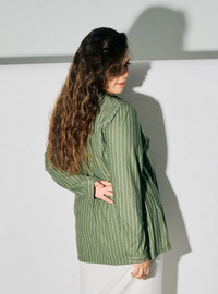 A woman dressed in Dusty Green Regular Striped Slim FIt Polo