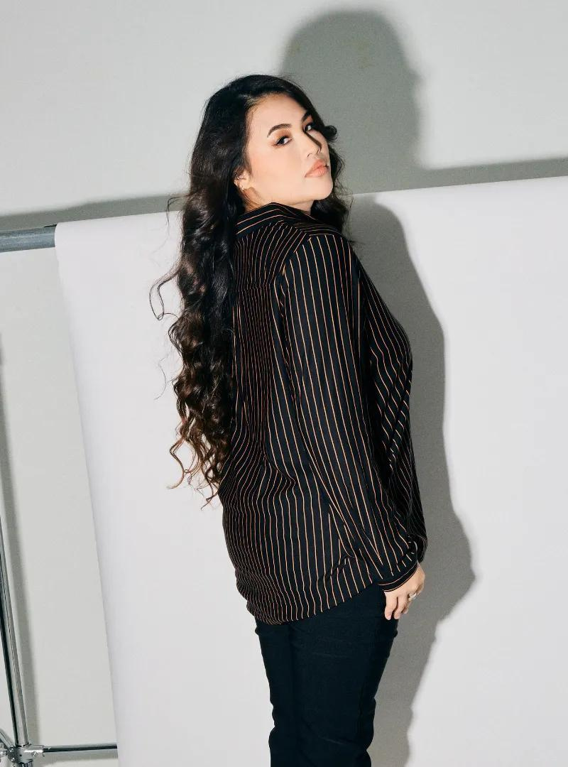 A woman dressed in Ginger Black Regular Striped Slim FIt Polo