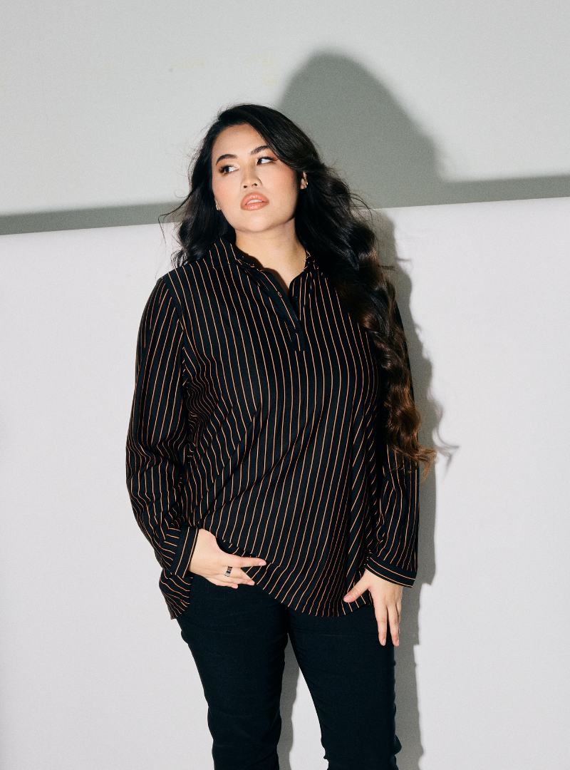 A woman dressed in Ginger Black Regular Striped Slim FIt Polo