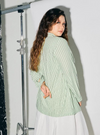 A woman dressed in Mint Green Regular Striped Slim FIt Polo