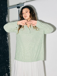 A woman dressed in Mint Green Regular Striped Slim FIt Polo