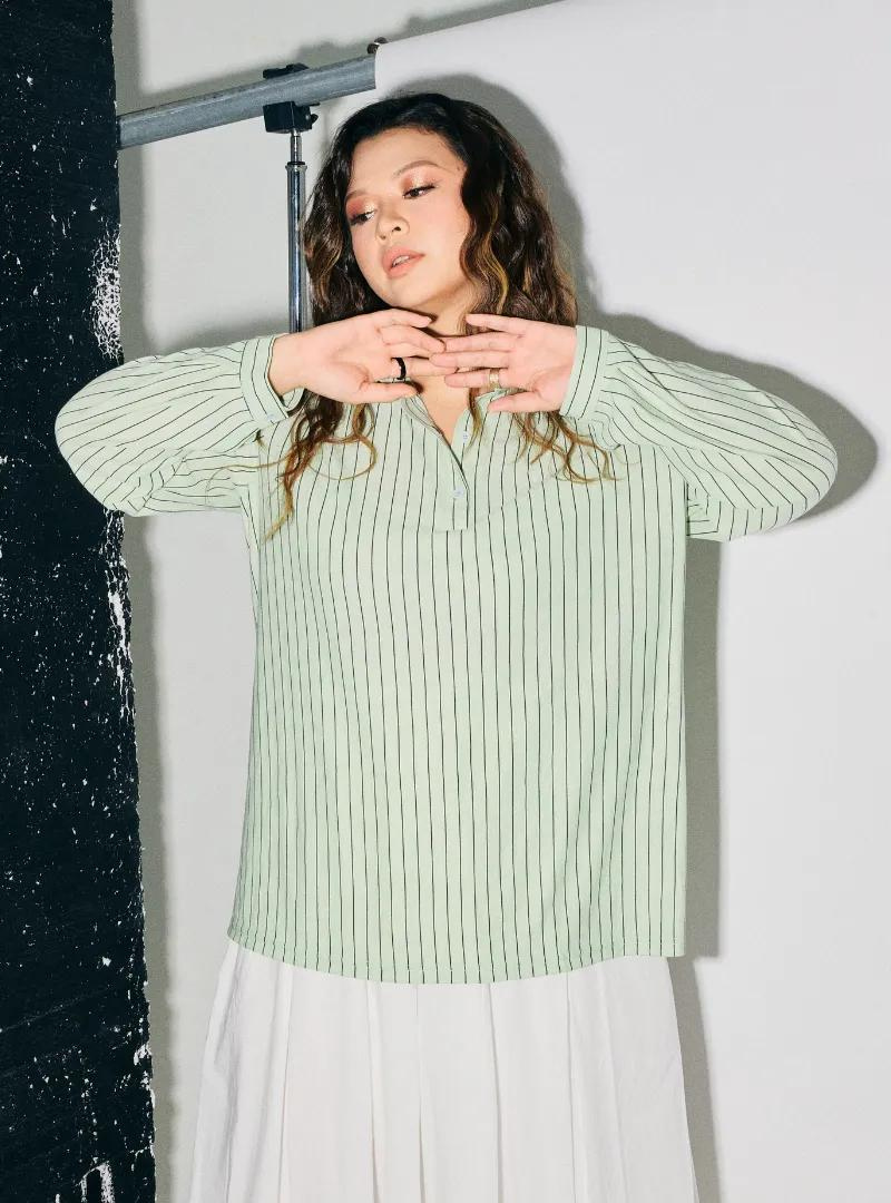 A woman dressed in Mint Green Regular Striped Slim FIt Polo