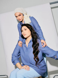 A woman dressed in Stone Blue Regular Striped Slim FIt Polo